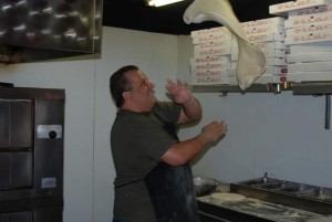 Owner Steve Lushaj in Action Tossing a Pizza