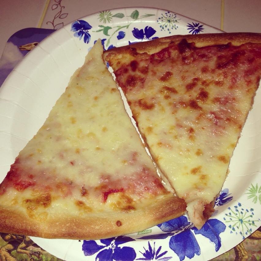 pizza slices with extra cheese