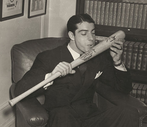 New York Yankee Joe Dimaggio Kissing his bat in 1941