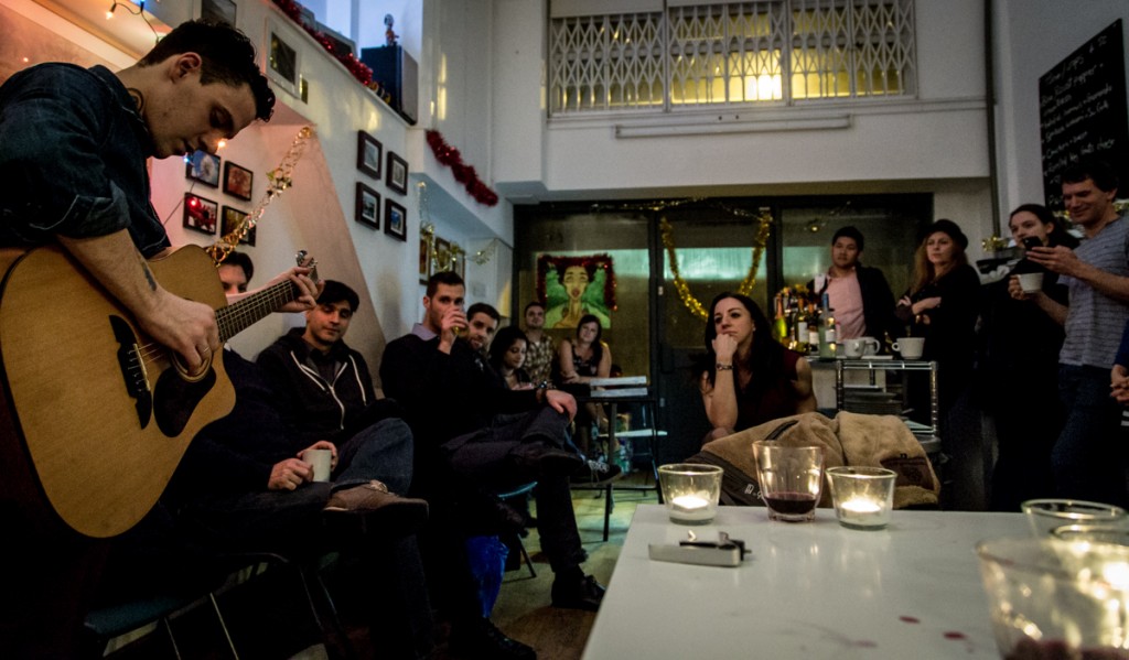 Oli from the Argentian Pizza Supper Club in Shoreditch. singing